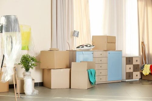 Furniture removals team handling bulky household items in Kingston