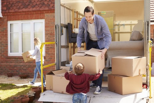 House removalists loading furniture for a Kingston home move