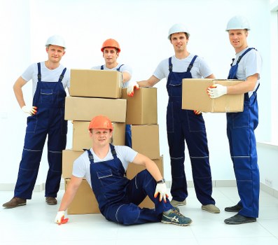 Moving service team loading furniture in Kingston