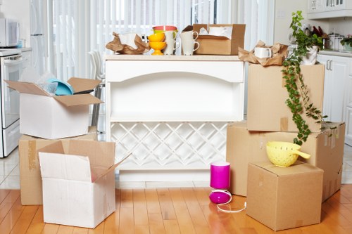 Removal team handling furniture carefully during a Kingston property move