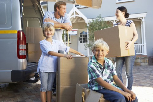 Careful unpacking of boxes in a Kingston property