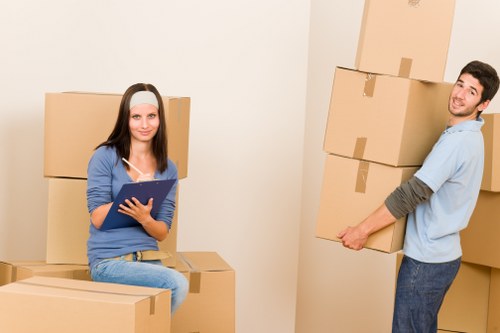 Packed boxes and furniture prepared for storage in Kingston
